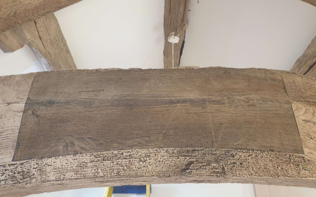 Reddish Brown Beams to an Antique Oak Finish