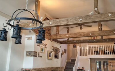 From Shiny White Beams to an Antique Oak Finish